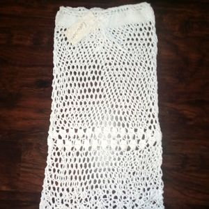 Over swimming suit and knitted dress